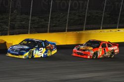 Kurt Busch and Jamie McMurray swapped the lead a total of five times before Busch held on to win the Coca-Cola 600 at Charlotte Motor Speedway. Credit: Drew Hallowell/Getty Images for NASCAR